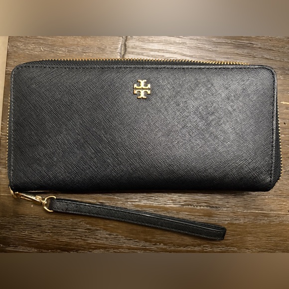 Tory Burch Handbags - Tory Burch Black Leather Large Wristlet with Gold tone hardware EUC
Make a Offer